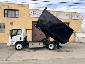 2015 Isuzu Switch and Go with 18 Yard Dumpster included